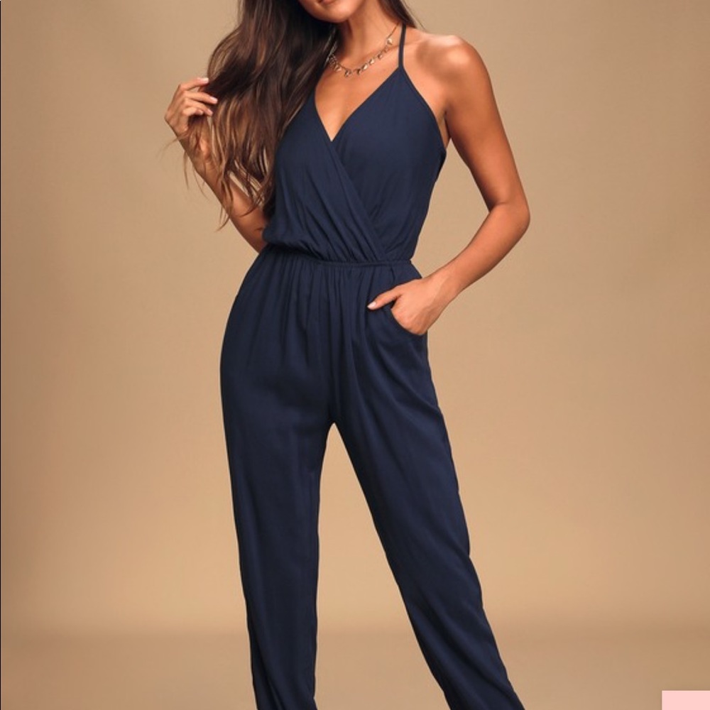 Navy blue halter jumpsuit. Never been worn.